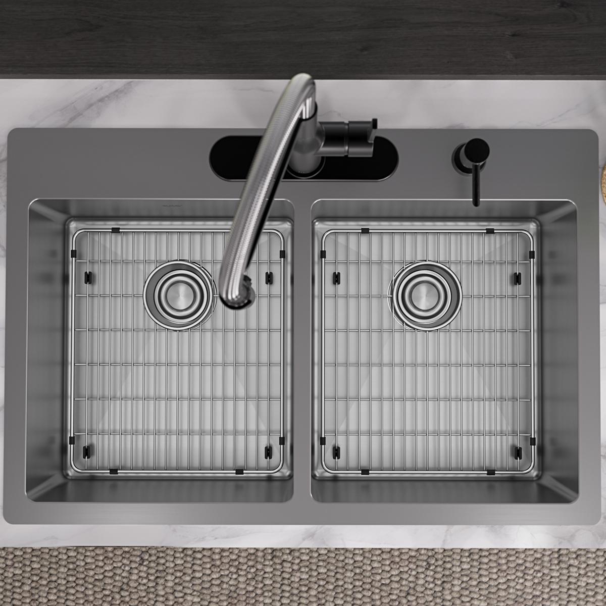 Stainless steel double bowl sink with two equal-sized basins, grid inserts, faucet with pull-down sprayer, and four mounting 