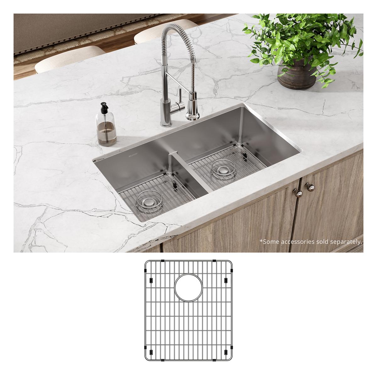 Stainless steel dual bowl sink with spray faucet installed in white marble countertop with included grid and drain accessorie