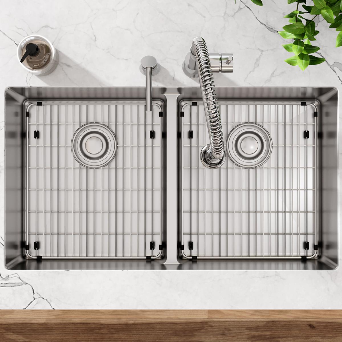 Stainless steel double bowl sink with two equal basins, grid inserts, center divider, faucet with spiral hose, and mounting h