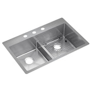 Stainless steel double bowl sink with left basin, right basin with grid insert, center divider, and three faucet holes along 