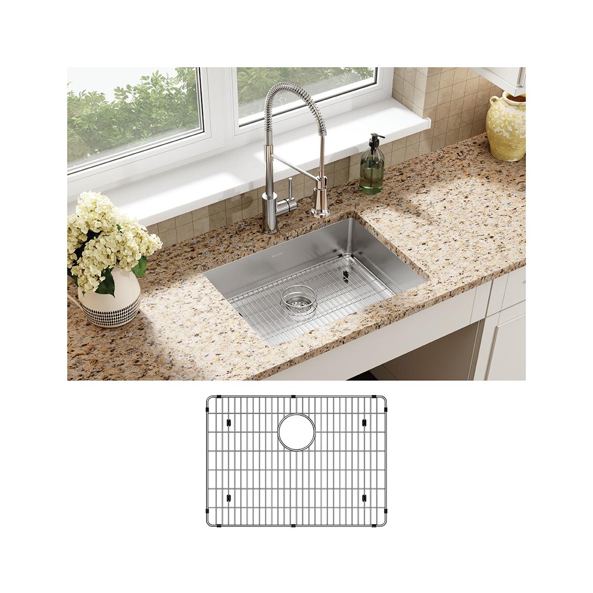 Stainless steel rectangular sink with single drain hole installed in granite countertop, shown with grid insert and sprayer f