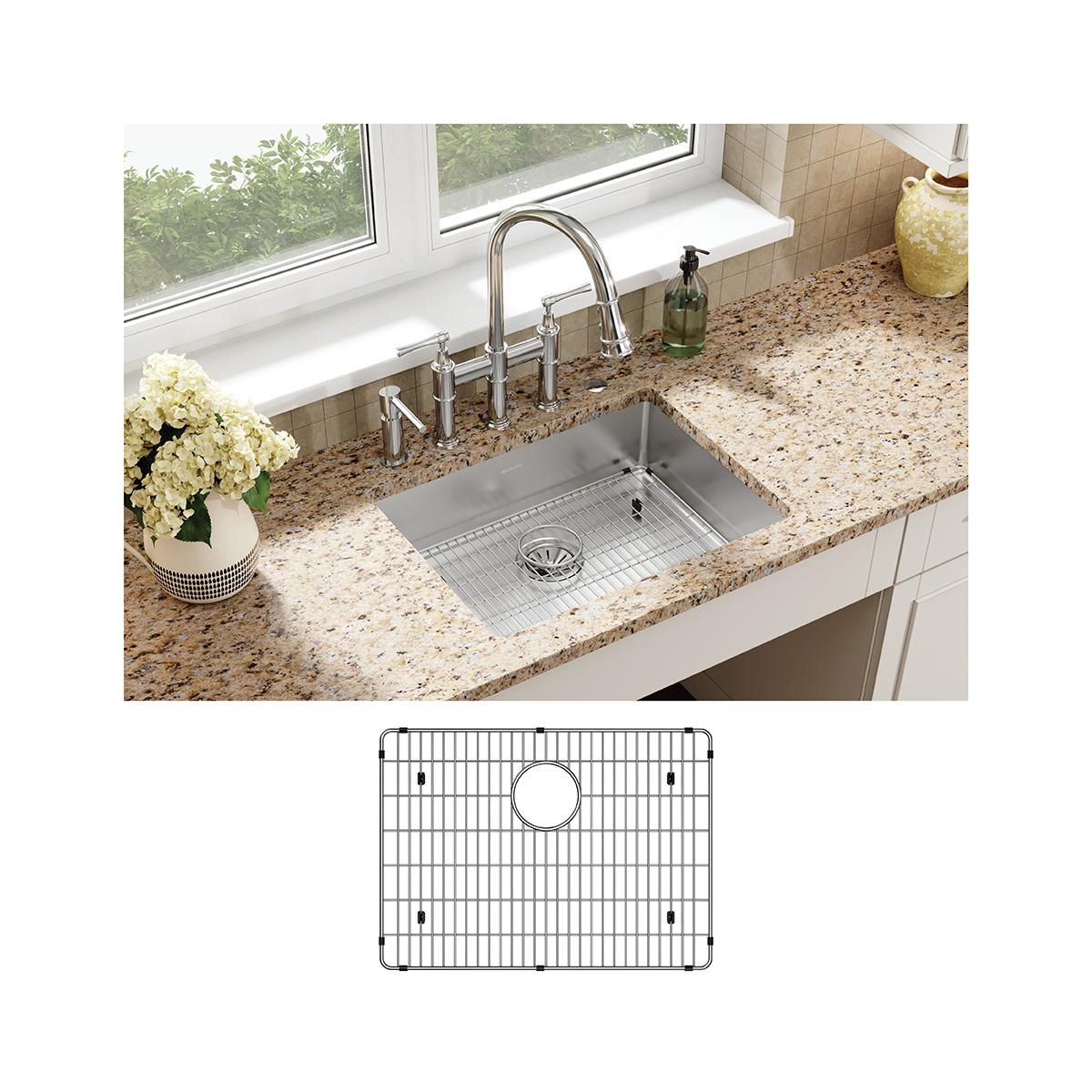 Stainless steel single bowl sink mounted in granite countertop with faucet, grid insert, and drain visible.