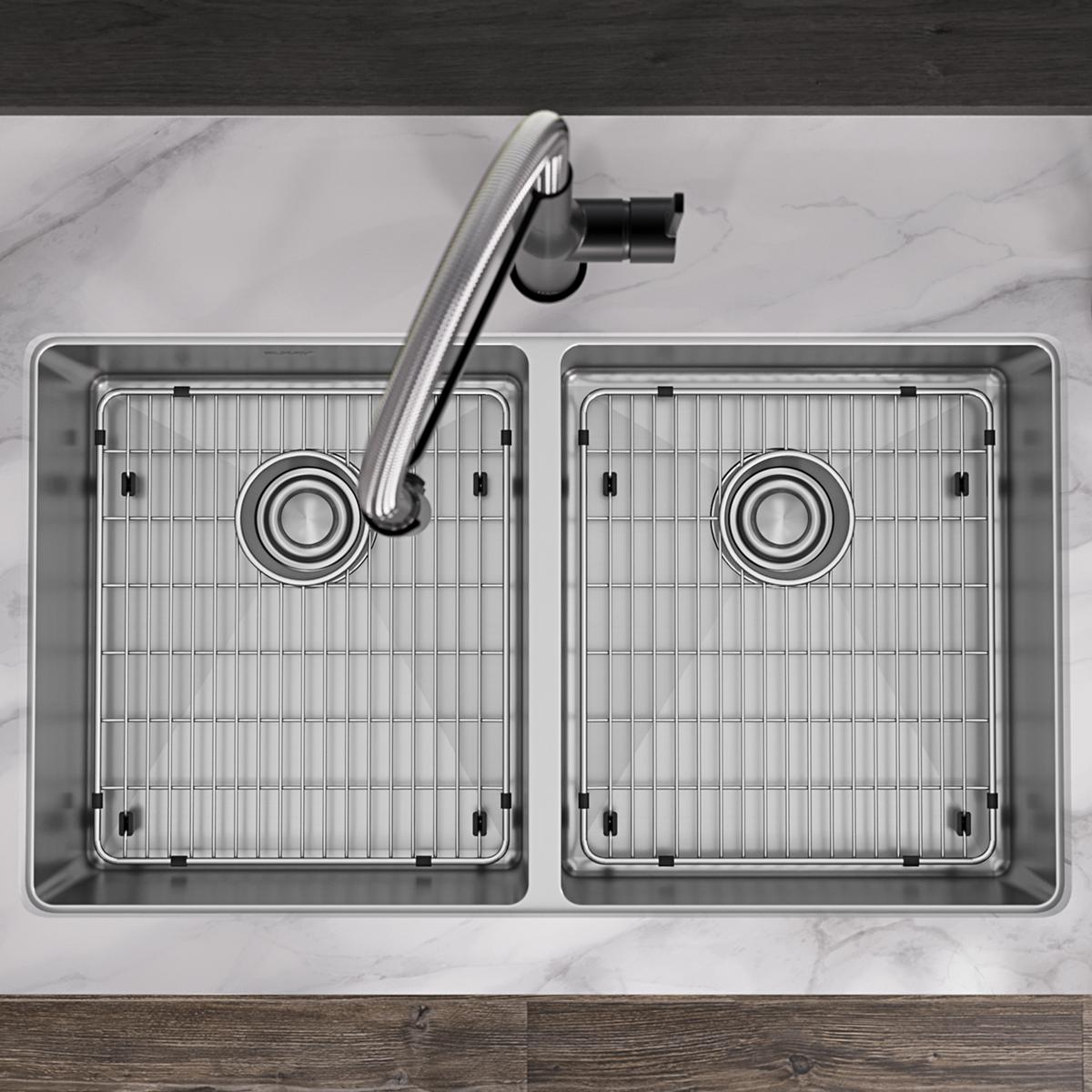 Stainless steel double bowl sink with equal-sized basins, single faucet, grid strainers, and black faucet handle mounted on m