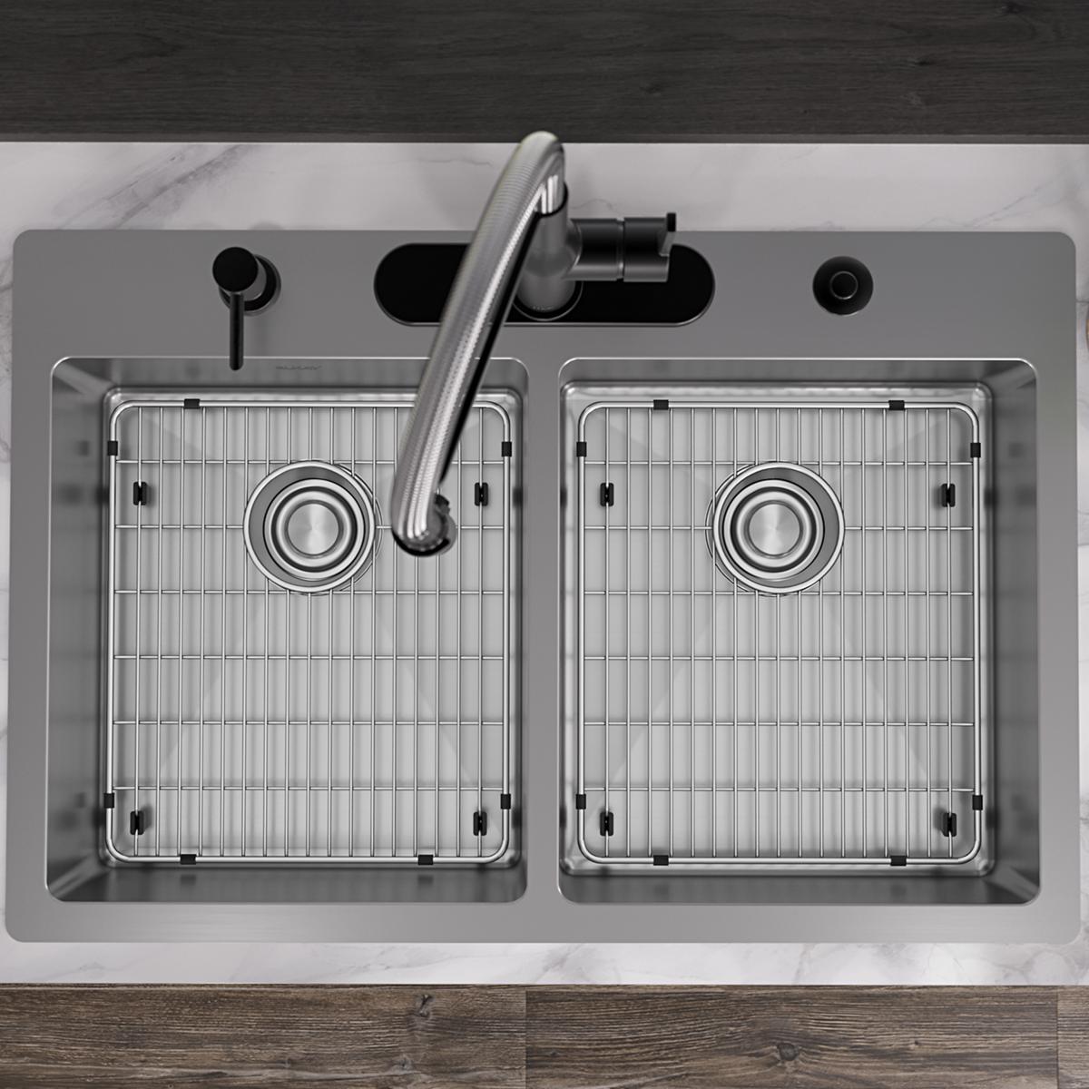 Stainless steel double bowl sink with two equal basins, grid inserts, drain holes, and curved faucet mounted on countertop.
