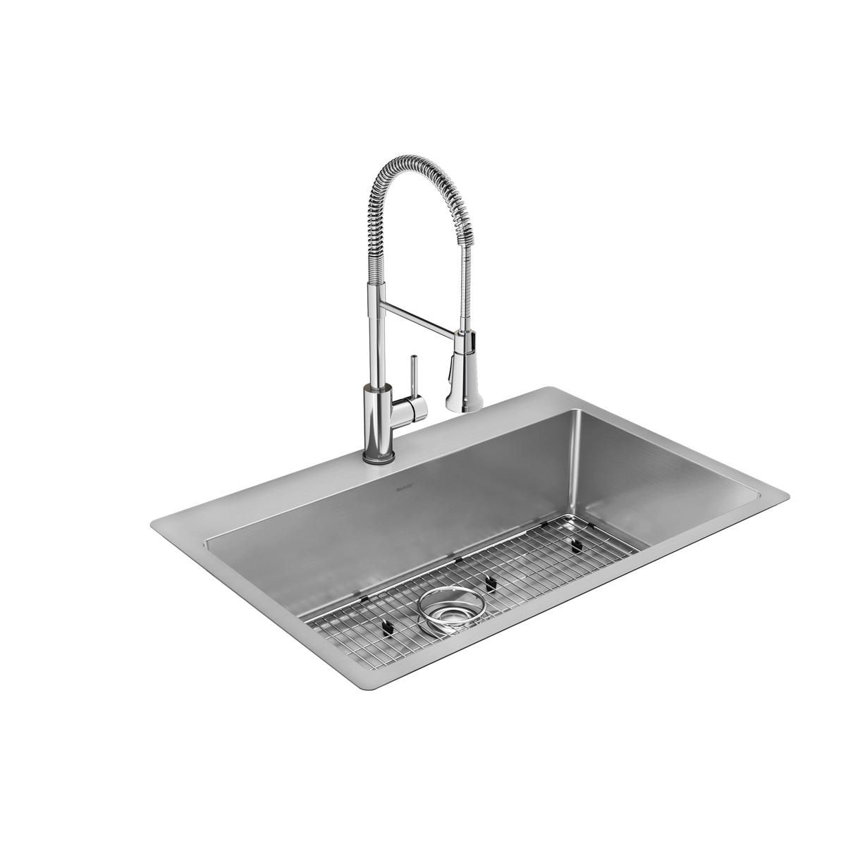 Stainless steel rectangular kitchen sink with single bowl, grid strainer, and pull-down spray faucet.