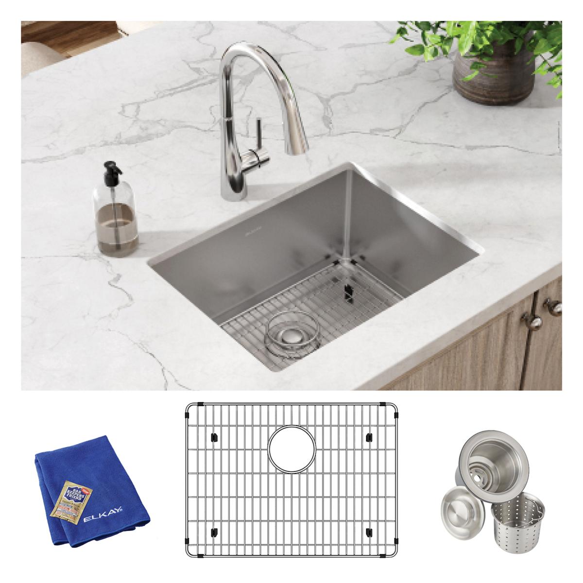 Stainless steel undermount kitchen sink with single basin, chrome pull-down faucet, grid, strainer basket, and blue cloth inc
