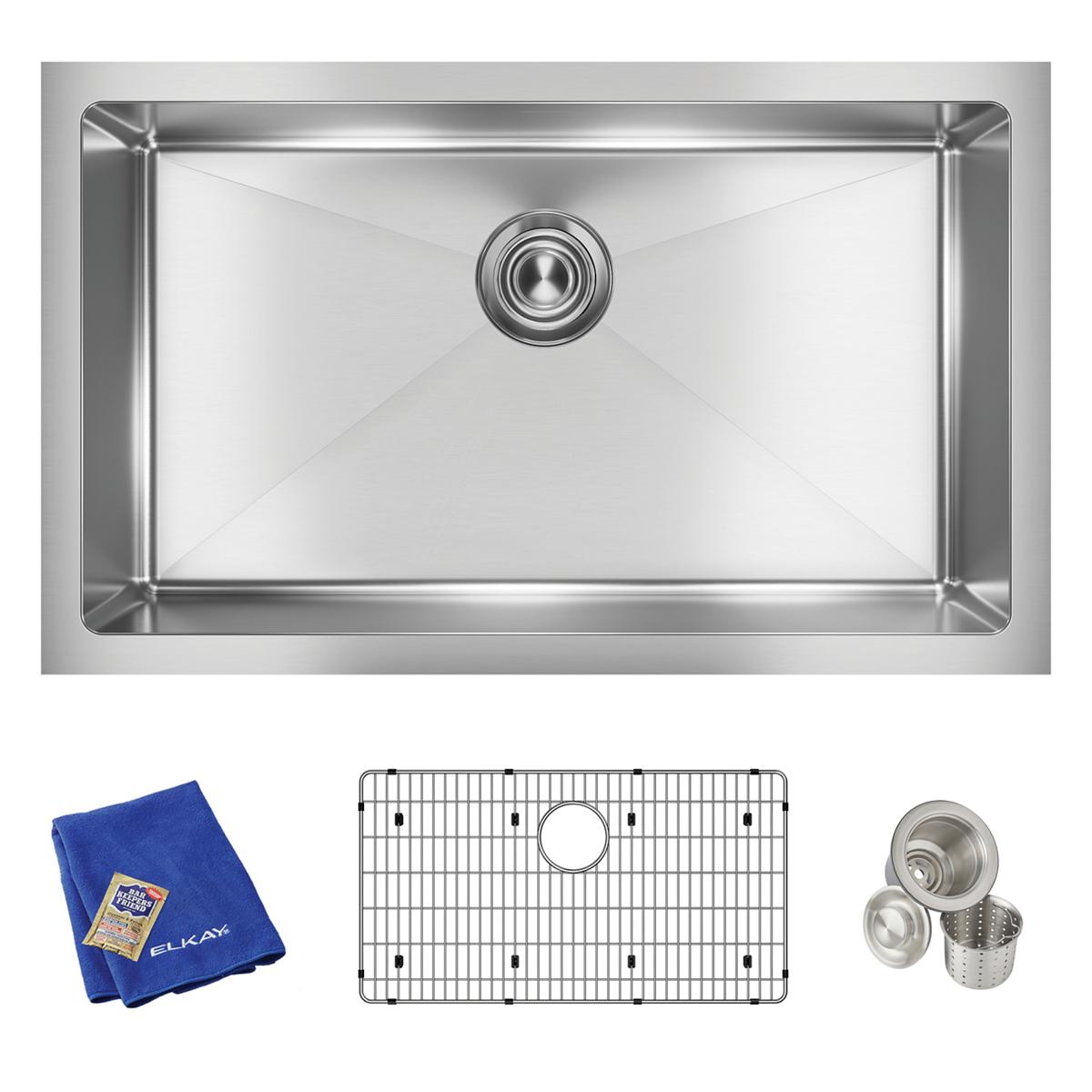 Stainless steel single bowl undermount sink with drain, includes grid, strainer basket, and blue cloth.