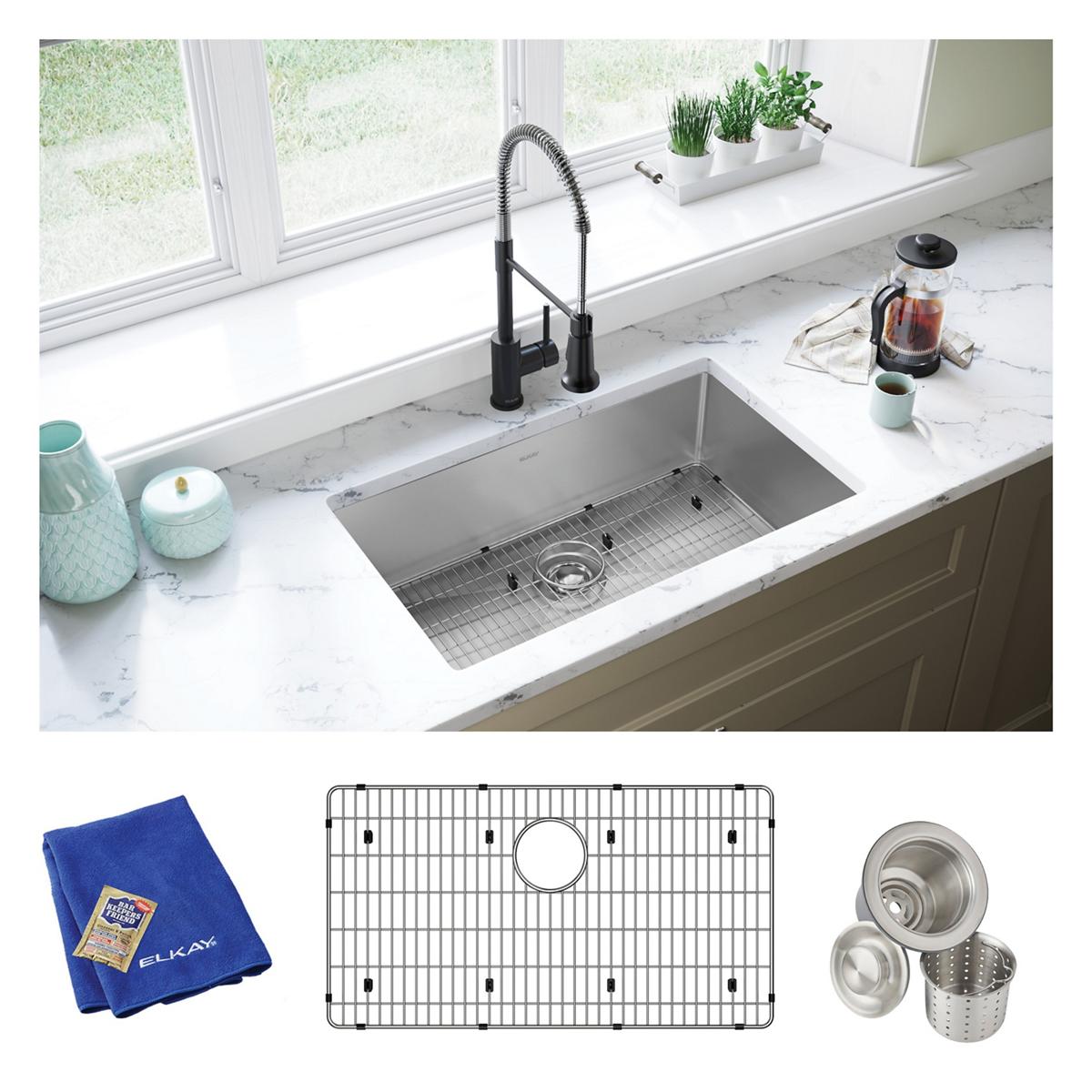 Stainless steel undermount kitchen sink with single bowl, grid mat, strainer basket, and blue microfiber cloth included.
