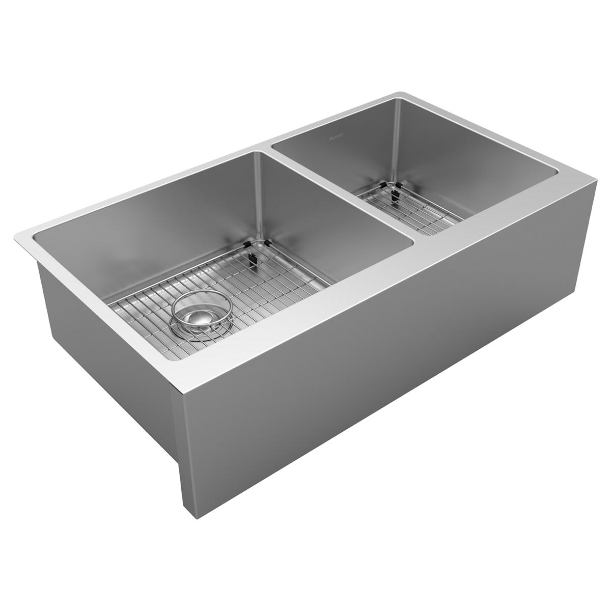 Stainless steel double bowl farmhouse sink with two rectangular basins, metal grids, and drain strainer visible.