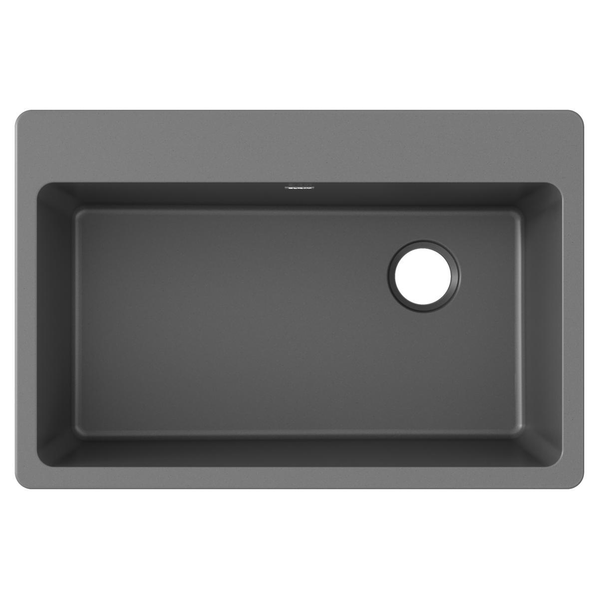 Dusk gray quartz drop-in sink with single bowl and drain hole, viewed from above.