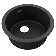 Black quartz bar sink with single round bowl and drain opening, viewed from above.