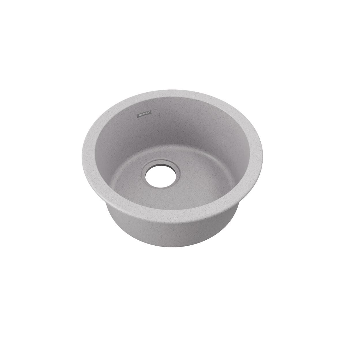 Greystone quartz round bar sink with single bowl and drain hole, viewed from above.