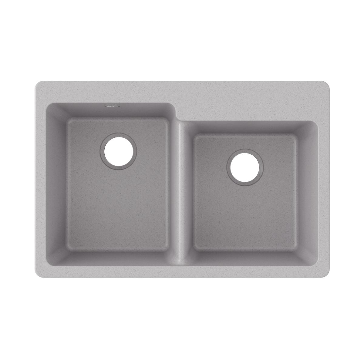 Greystone quartz double bowl drop-in sink with offset basins and drain holes.