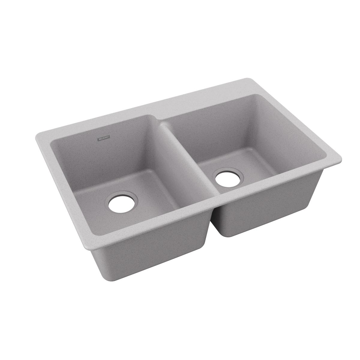 Greystone quartz double bowl drop-in sink with offset bowls and drain holes.