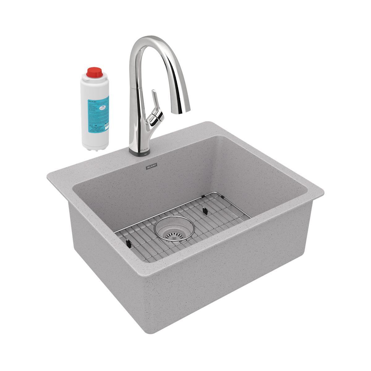 Greystone quartz single-bowl drop-in sink with chrome arc faucet, sink grid, and replacement water filter cartridge.