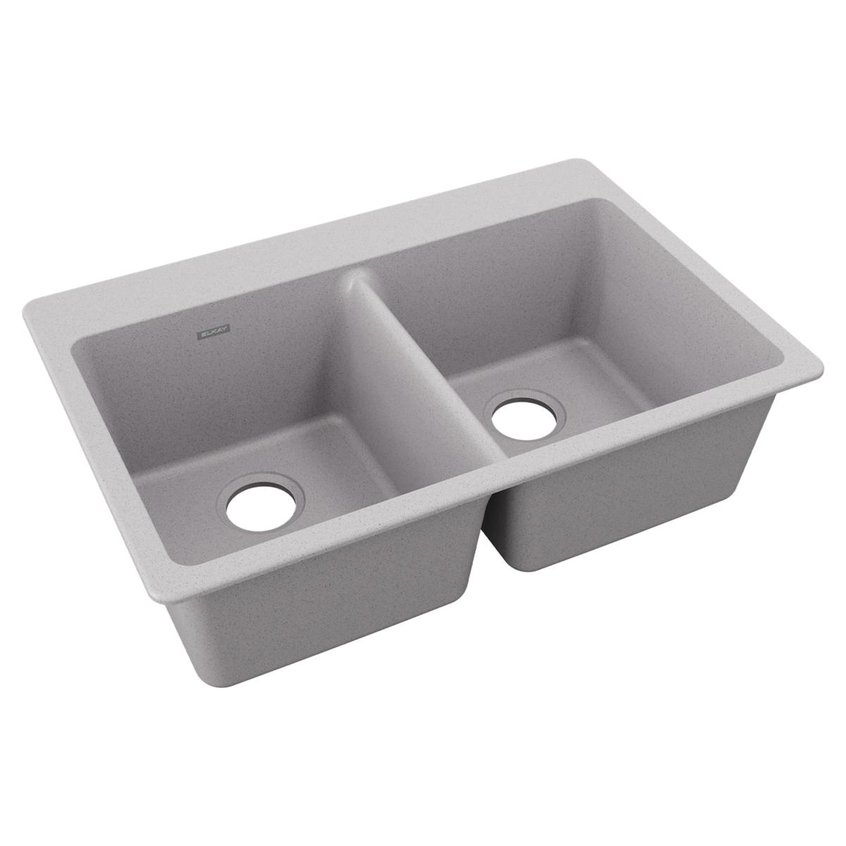 Greystone quartz double bowl drop-in sink with two equal basins and drain holes.