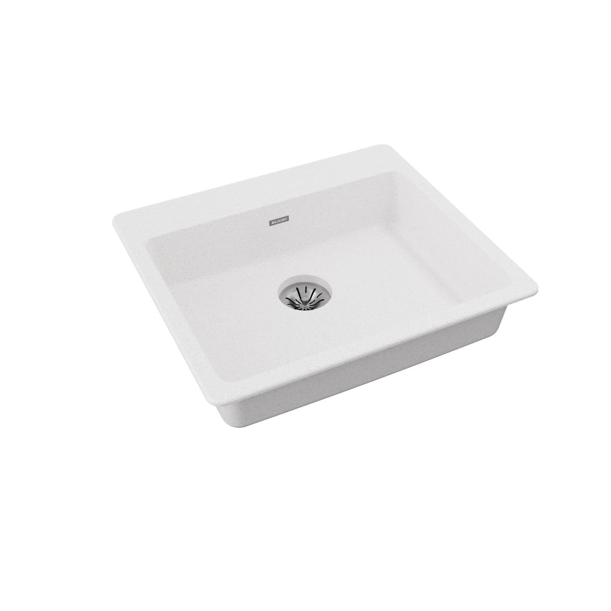 White quartz drop-in sink with single bowl and drain basket visible from above.