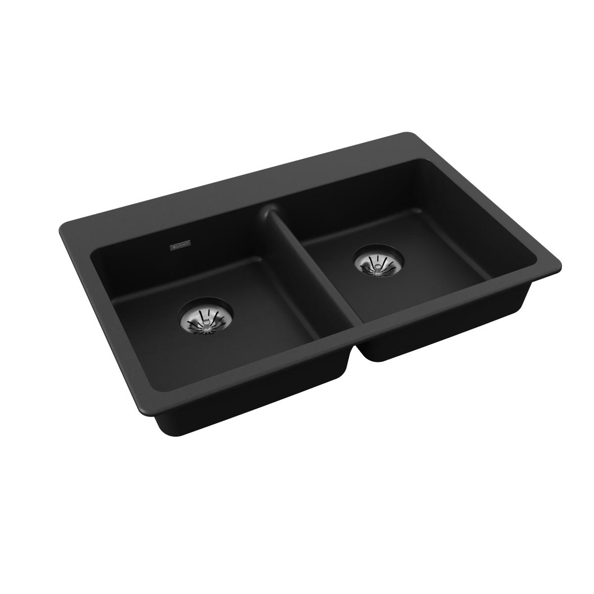 Black quartz double bowl drop-in sink with two drains and rounded rim edges.