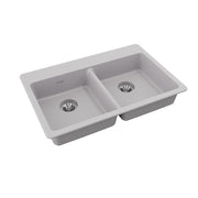 Greystone quartz double bowl drop-in sink with two drain openings and rounded rim edges.