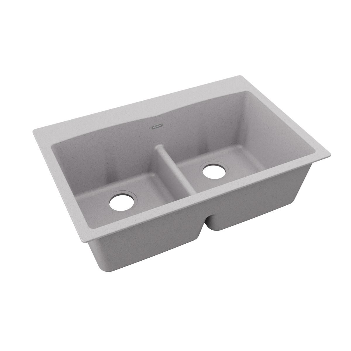 Greystone quartz double bowl drop-in sink with center divider and two drain holes.