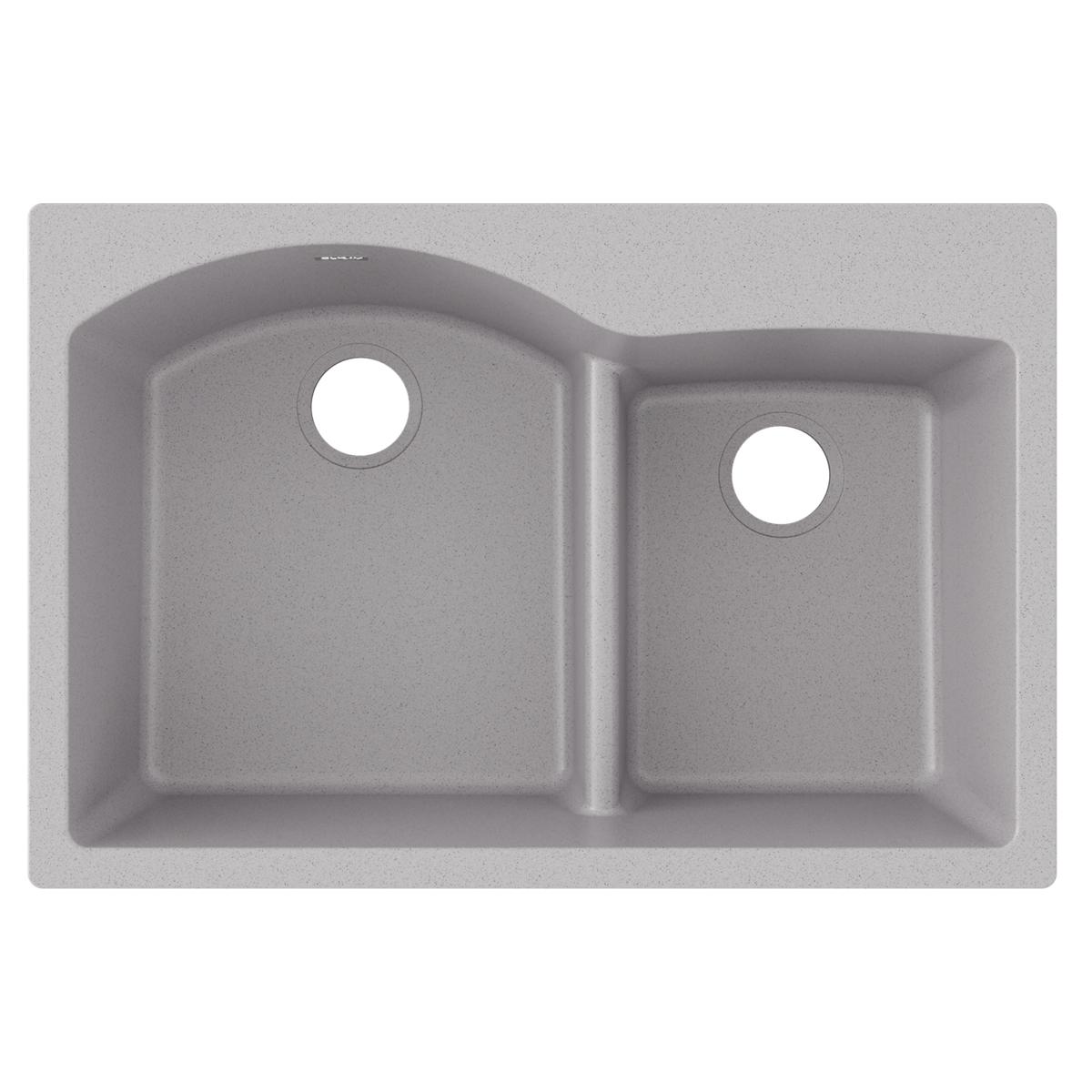 Greystone quartz drop-in sink with two unequal bowls separated by divider and faucet holes.