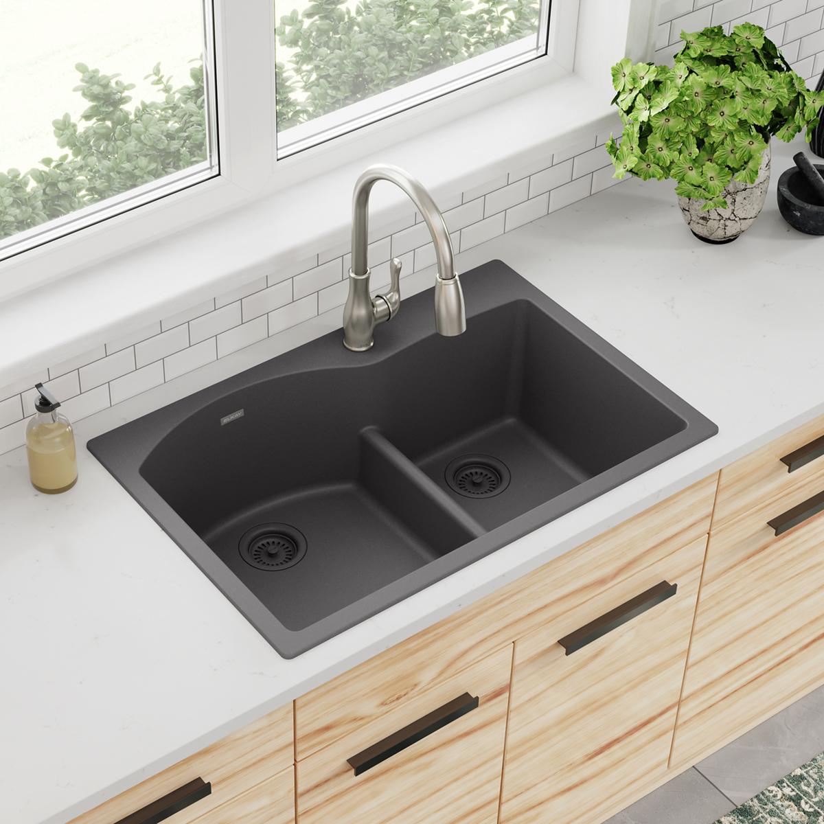 Dusk gray quartz double bowl drop-in kitchen sink with divider, dual drains, and brushed nickel faucet installed in white cou