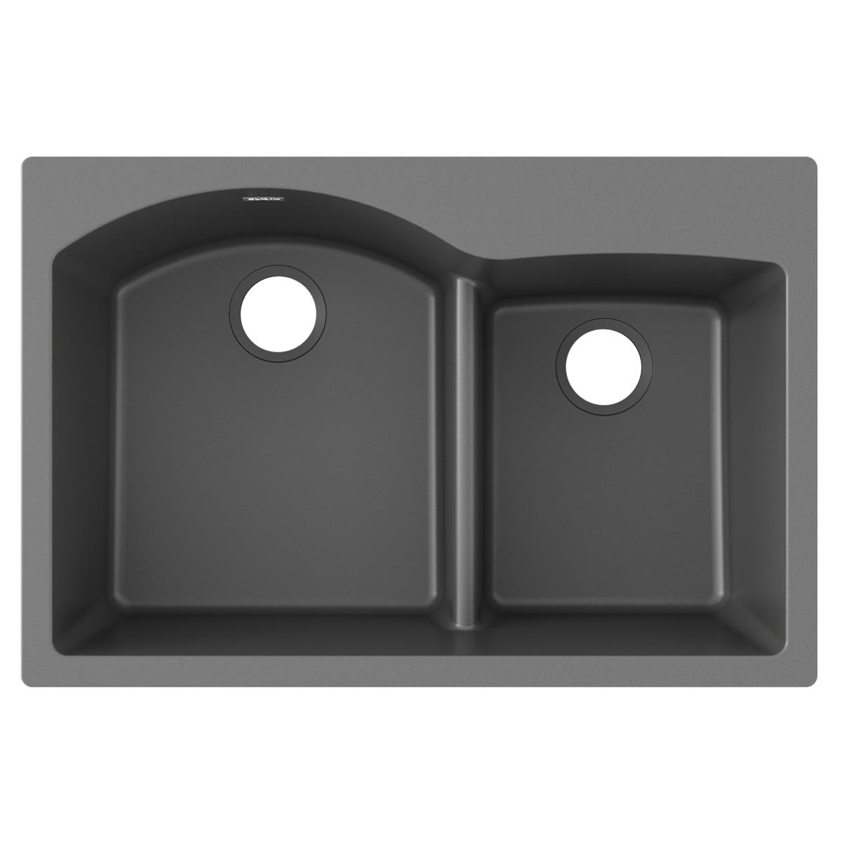 Dusk gray quartz drop-in sink with two unequal bowls separated by a divider and drain openings.