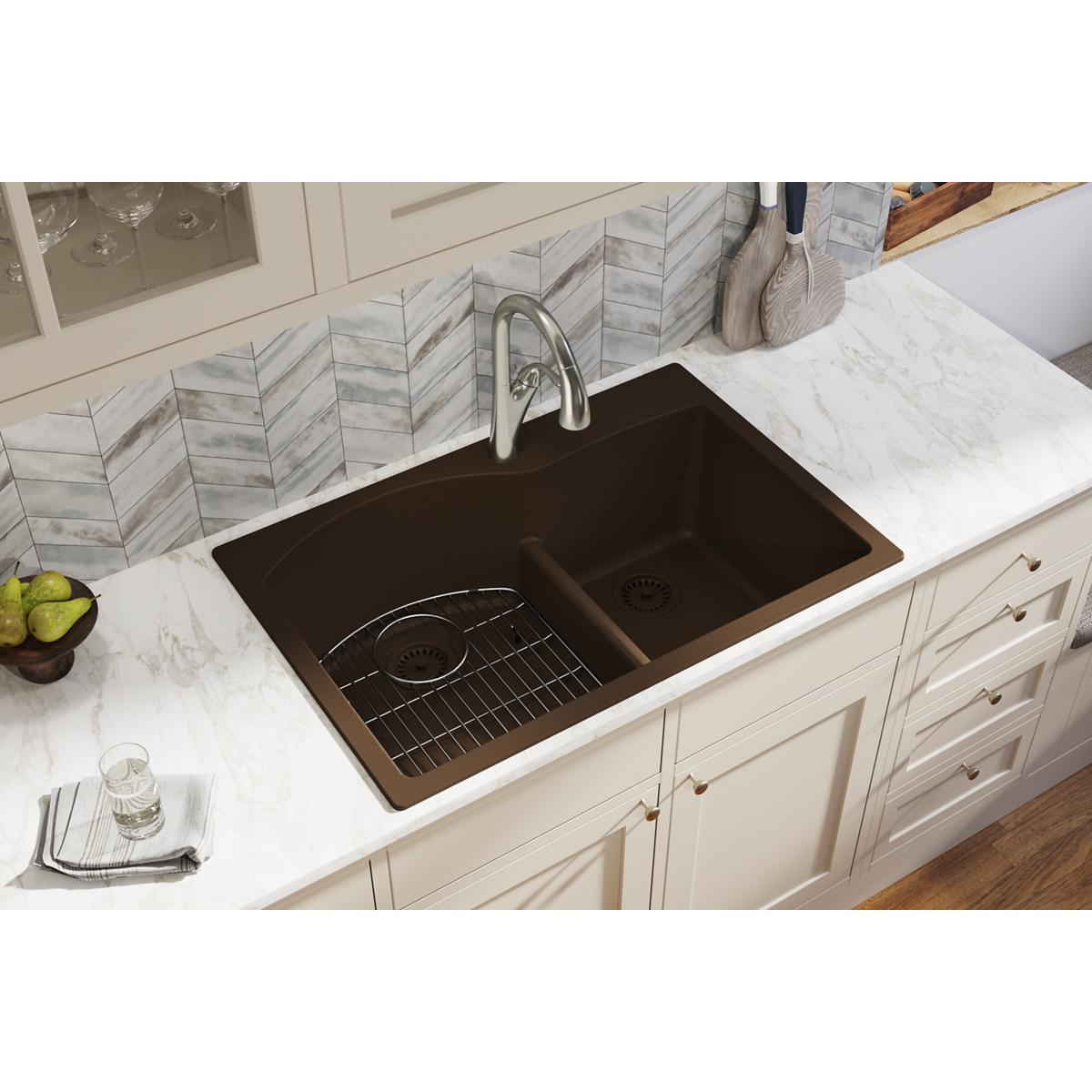 Mocha quartz double bowl drop-in sink with offset 60/40 compartments, divider, and grid inserts installed in white countertop