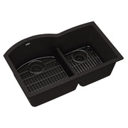 Black quartz double bowl undermount sink with offset basins, metal grids, and drain strainers.