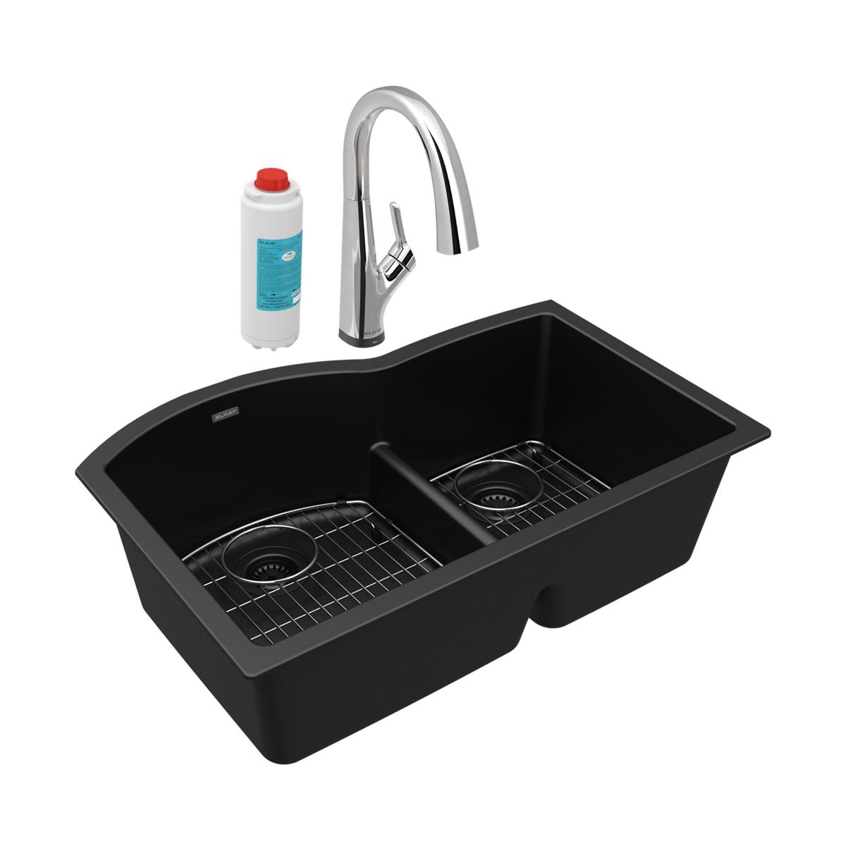 Black quartz double bowl undermount sink with chrome pull-down faucet, filter cartridge, and stainless steel grids.