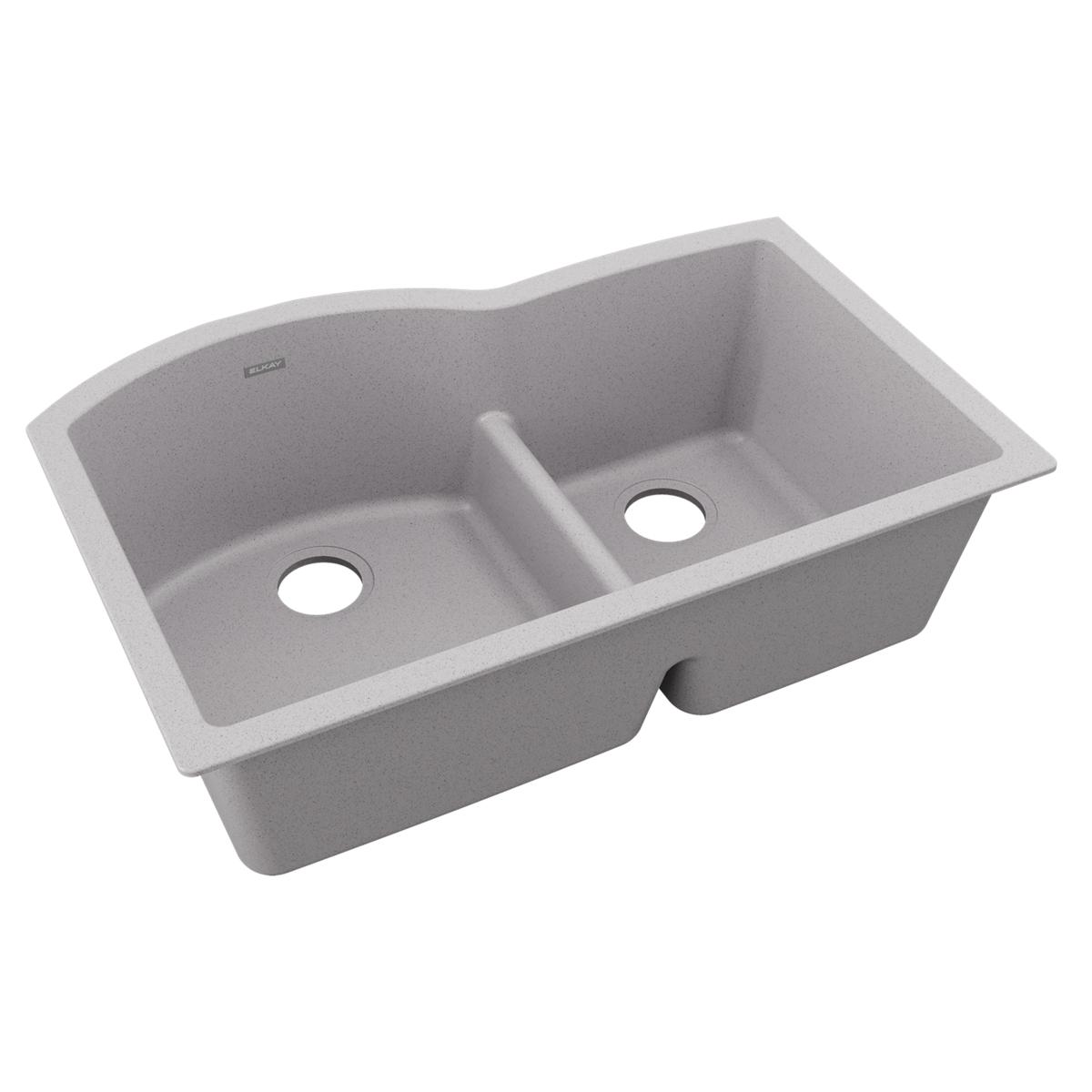 Greystone quartz double bowl undermount sink with offset 60/40 basins and center divider.