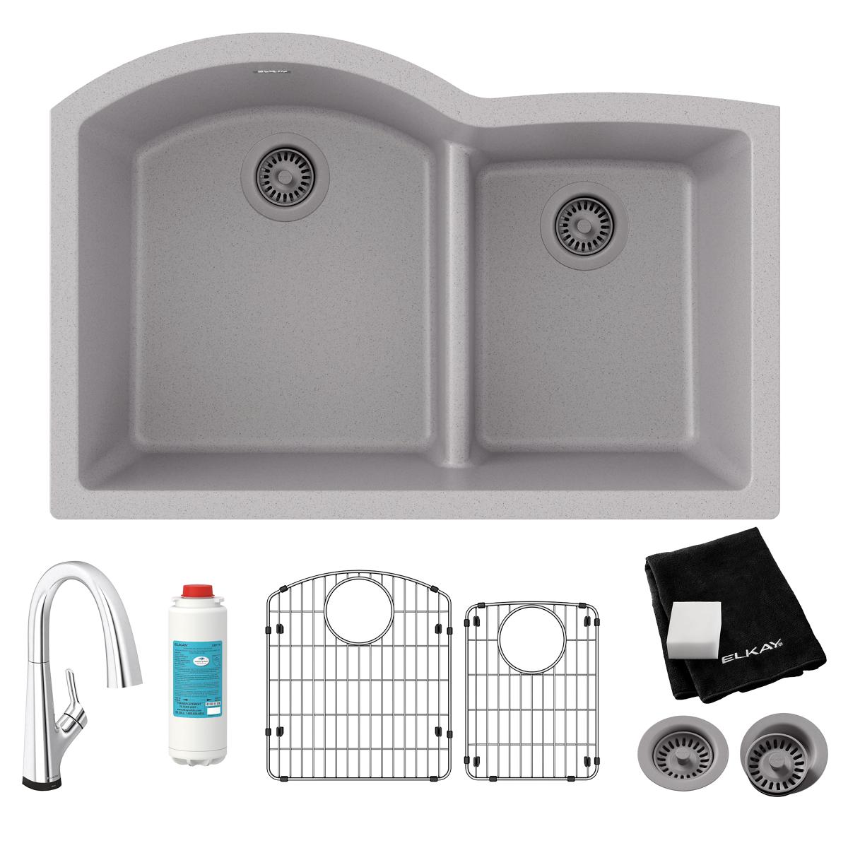 Greystone quartz double bowl undermount sink kit with offset bowls, filtered faucet, drains, grids, and cloth.