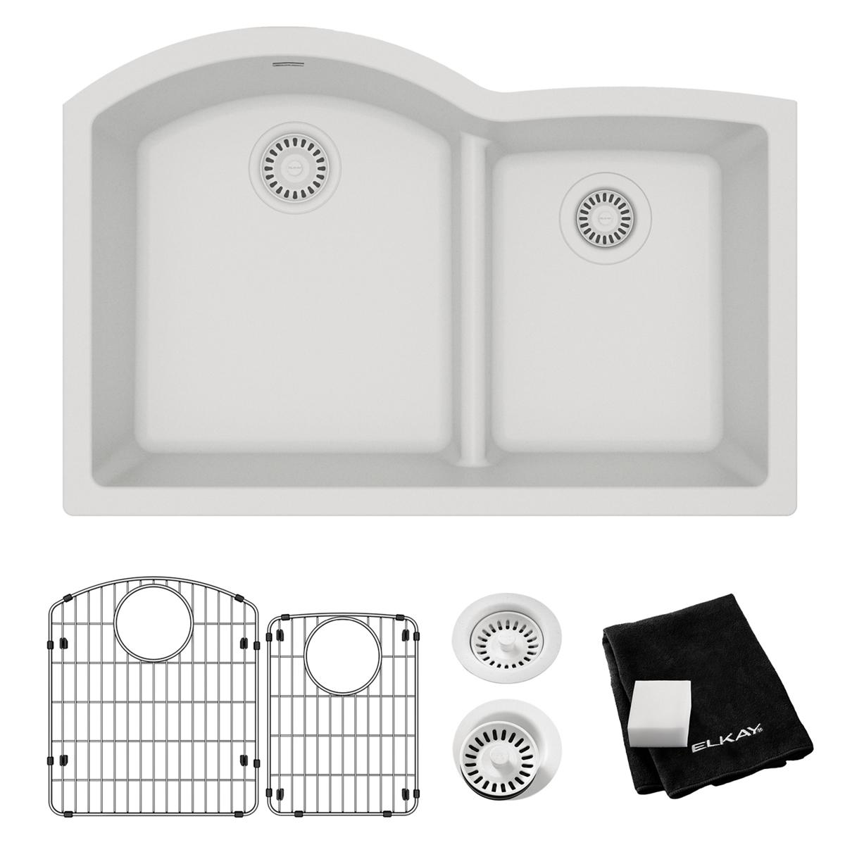 White quartz double bowl undermount sink with offset basins, drain strainers, grid protectors, and care cloth included.