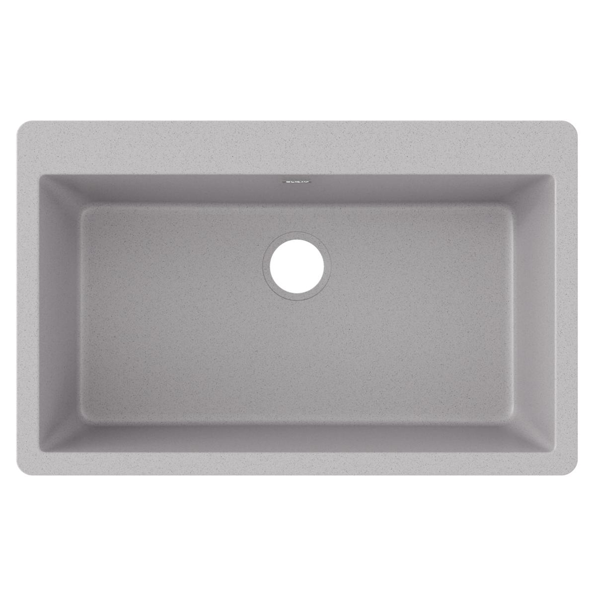 Greystone quartz single bowl drop-in sink with rounded corners and drain hole, viewed from above.