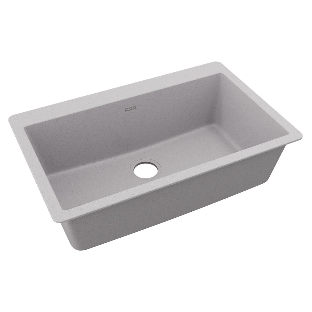 Greystone quartz drop-in sink with single rectangular bowl and center drain opening.