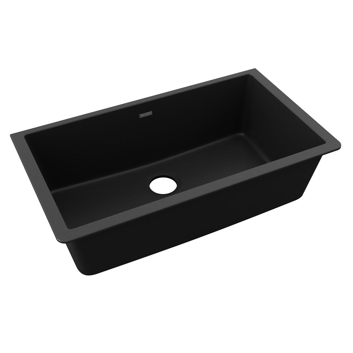 Black quartz undermount sink with single rectangular bowl and drain opening.