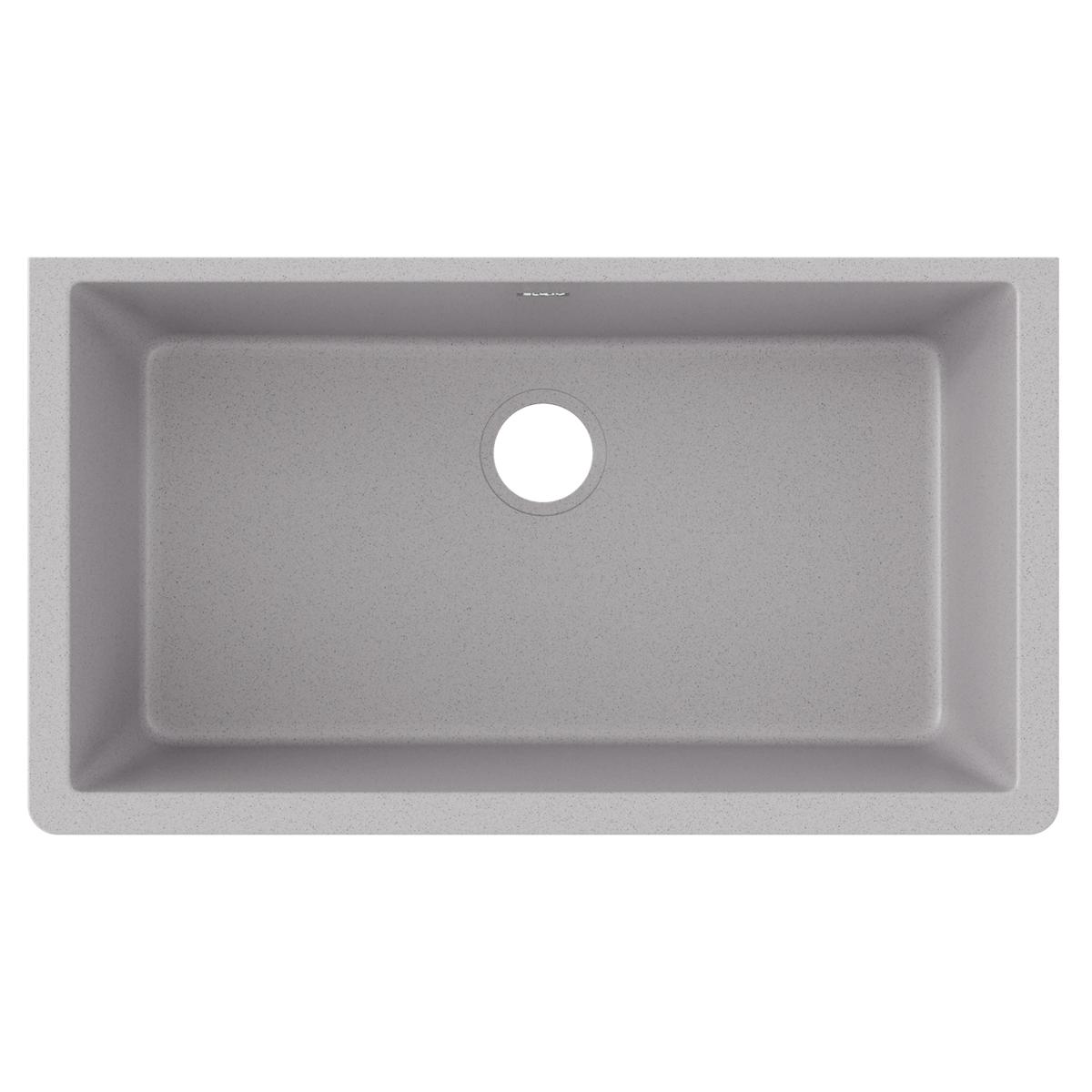 Greystone quartz single bowl undermount sink with rounded corners and center drain hole, top view.