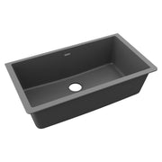 Dusk gray quartz single bowl undermount sink with drain hole and sloped interior.