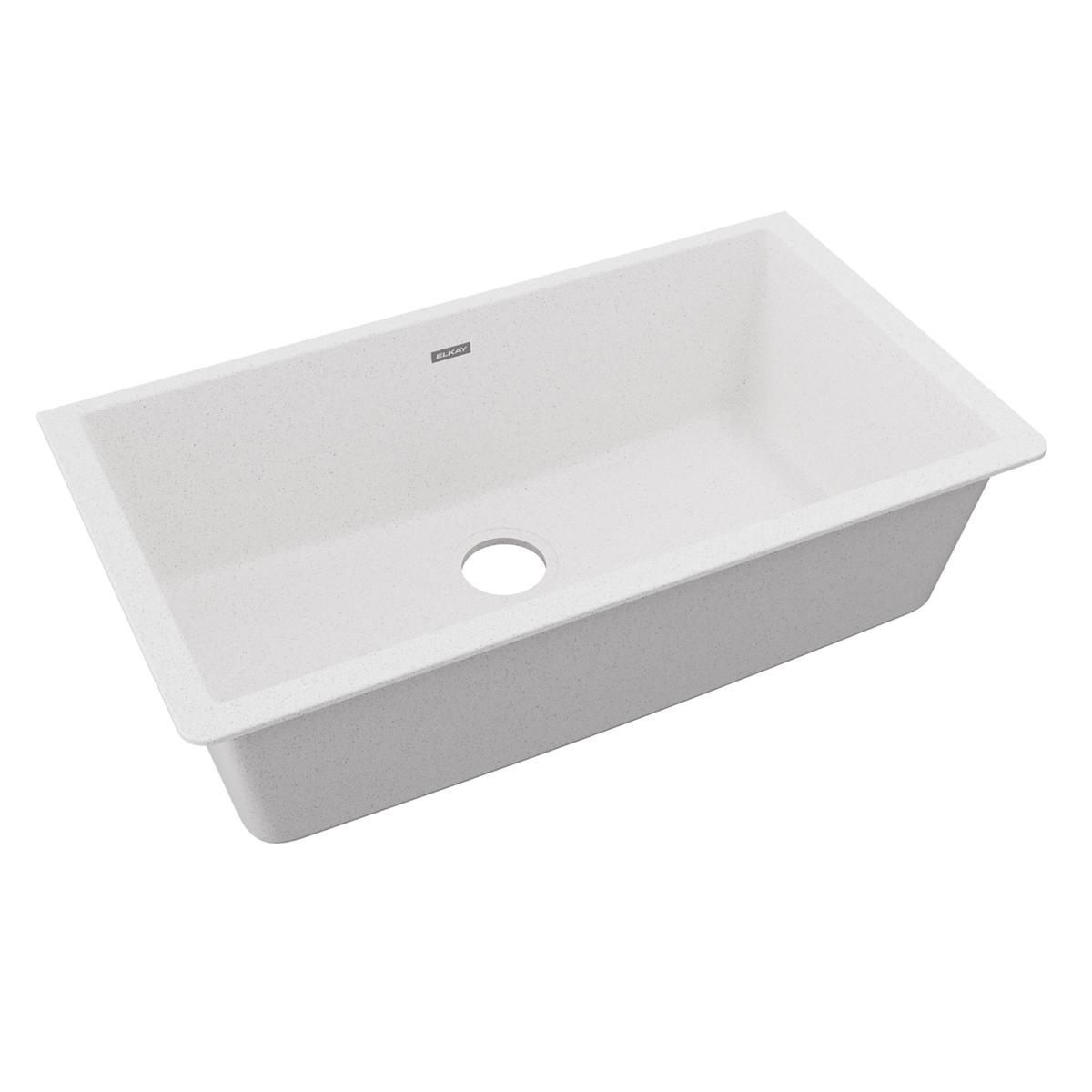 White quartz single bowl undermount sink with drain hole and Elkay brand mark visible.
