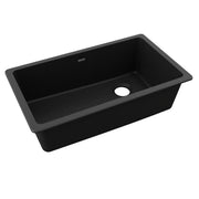 Black quartz undermount kitchen sink with single bowl and rounded corners.