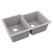 Greystone quartz double bowl undermount sink with offset bowls and drain holes visible.