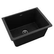 Black quartz undermount laundry sink with single basin and drain fitting.