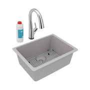 Greystone quartz single bowl undermount sink with chrome pull-down faucet, grid insert, and water filter cartridge.