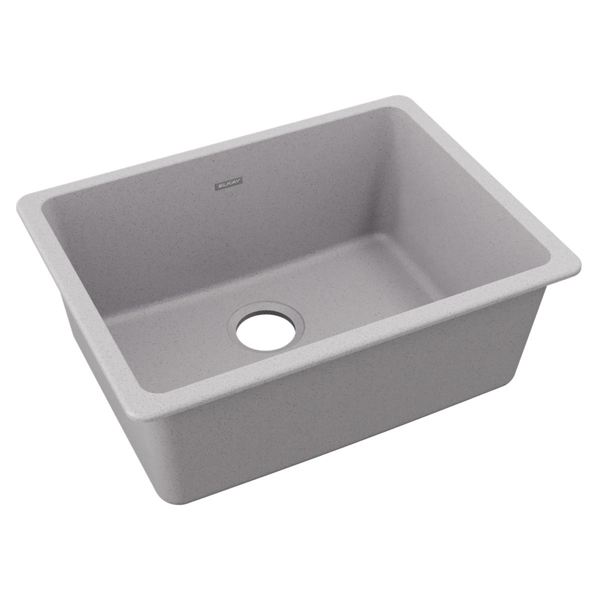 Greystone quartz single bowl undermount sink with rounded corners and center drain hole.