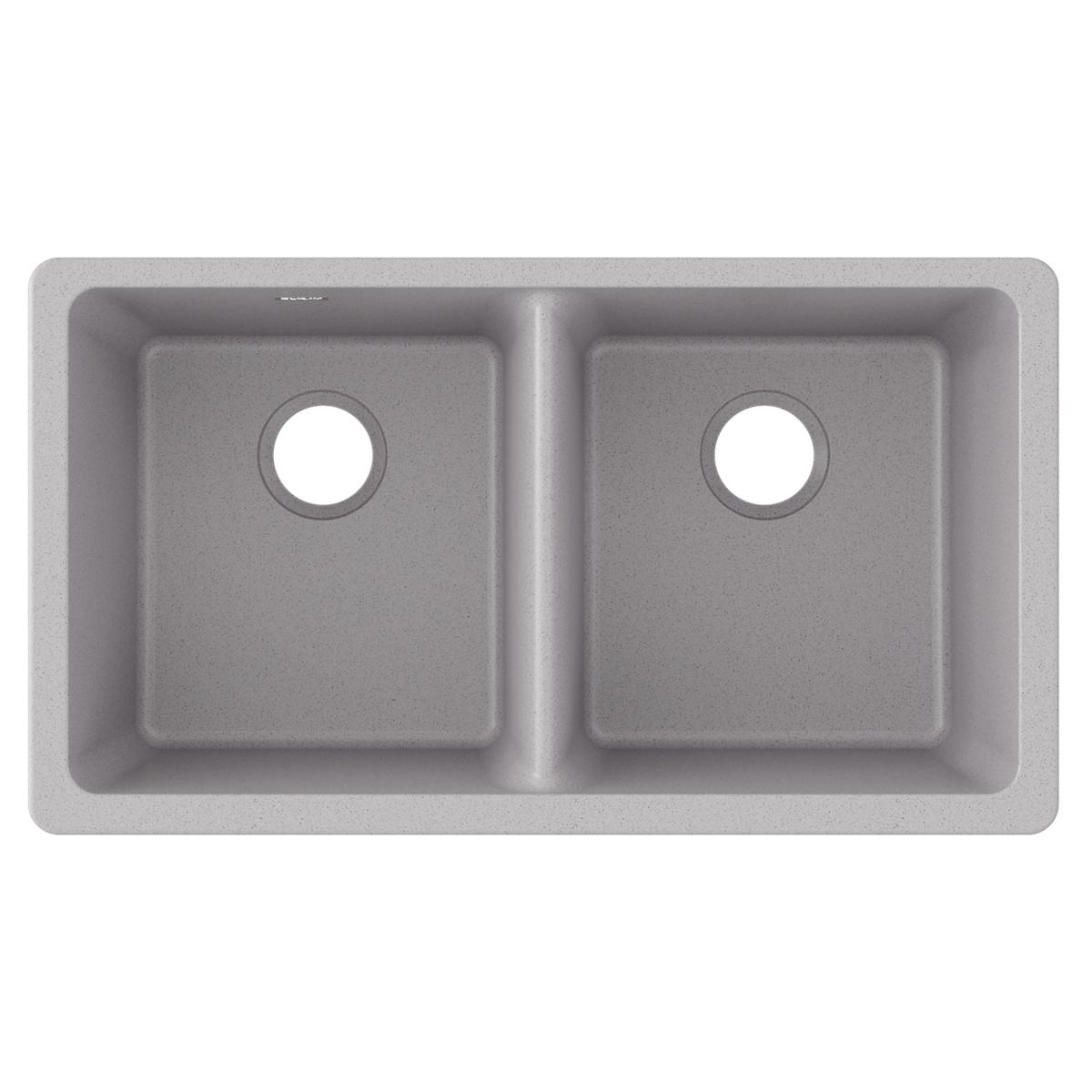 Greystone quartz double bowl undermount sink with two equal rectangular basins and drain holes.