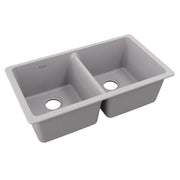 Greystone quartz double bowl undermount sink with two equal-sized basins and drain holes.