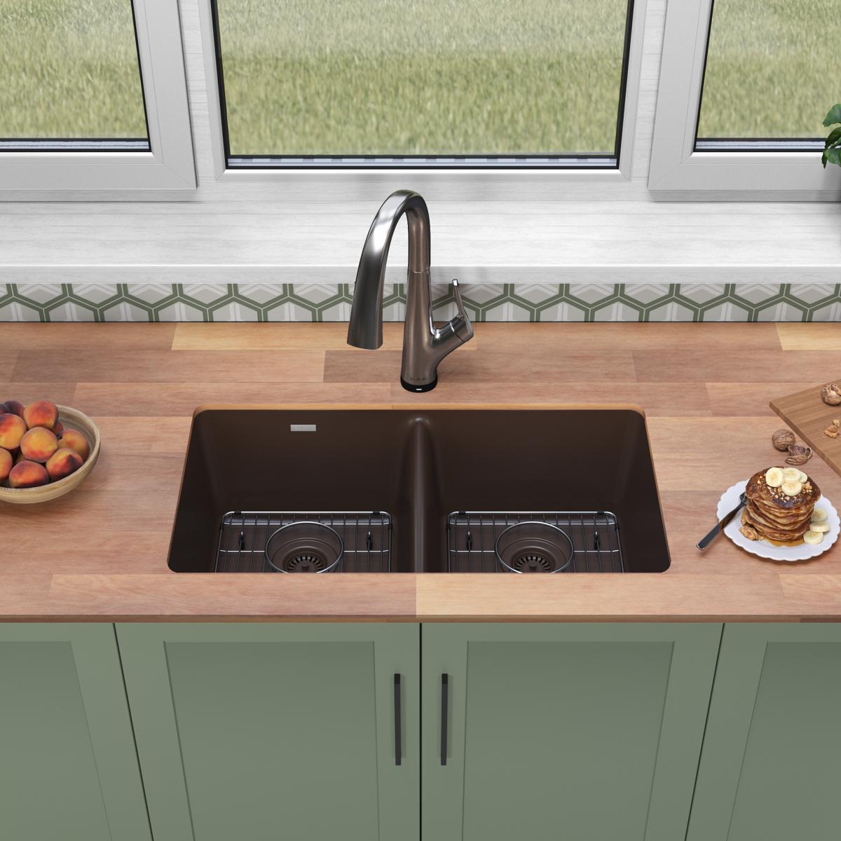 Mocha quartz double bowl undermount sink with two equal compartments, grid inserts, and matching pull-down faucet installed i