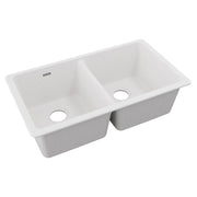 White quartz double bowl undermount sink with two equal basins and drain holes.