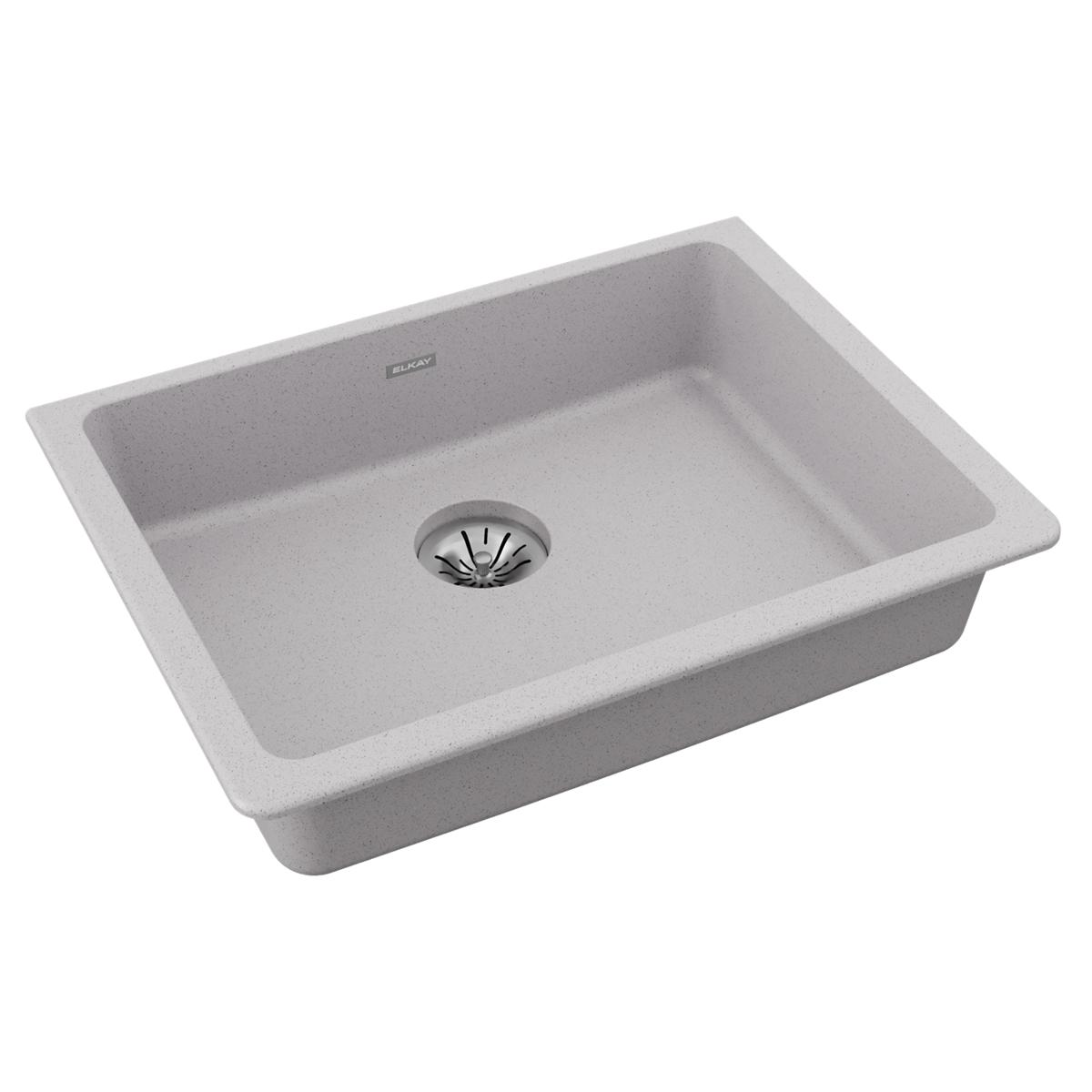 Greystone quartz single bowl undermount sink with drain basket, angled view showing interior basin and drainage opening.