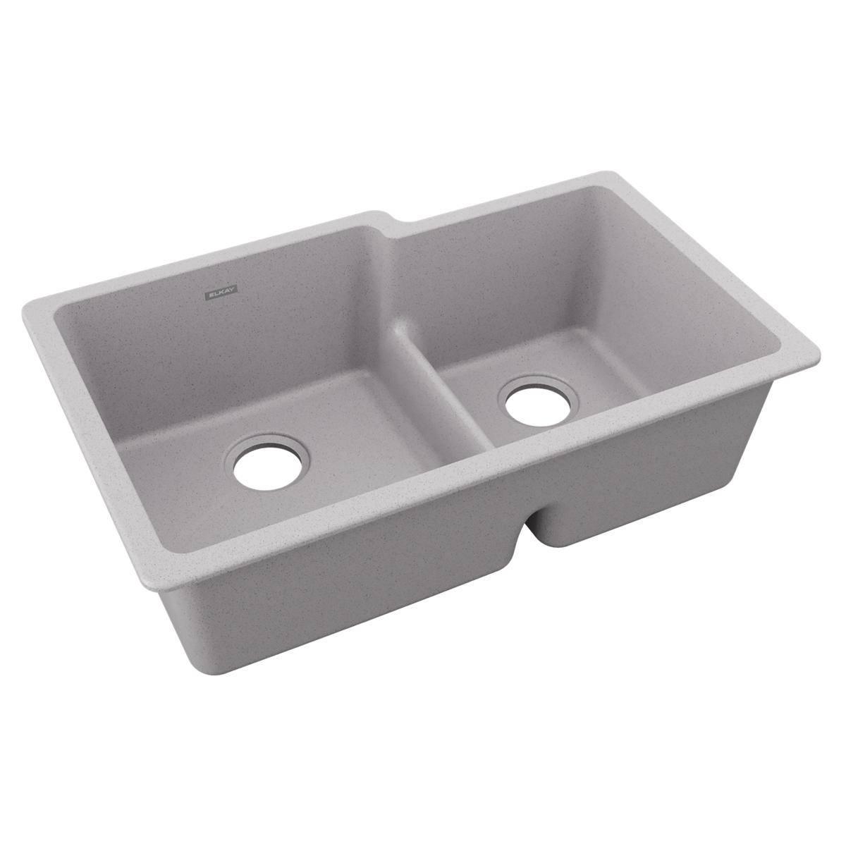Greystone quartz double bowl undermount sink with unequal 60/40 basin sizes and center divider.